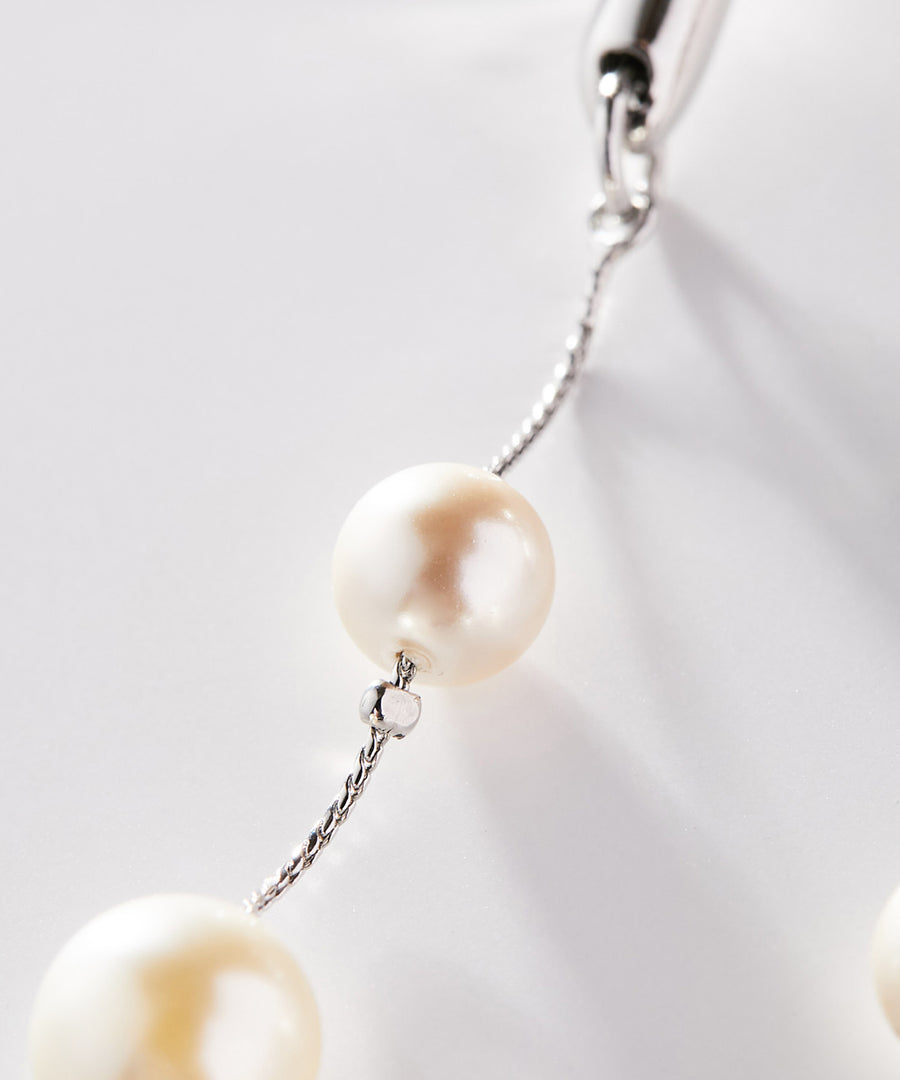 FRAGMENT arm double pearl pierce