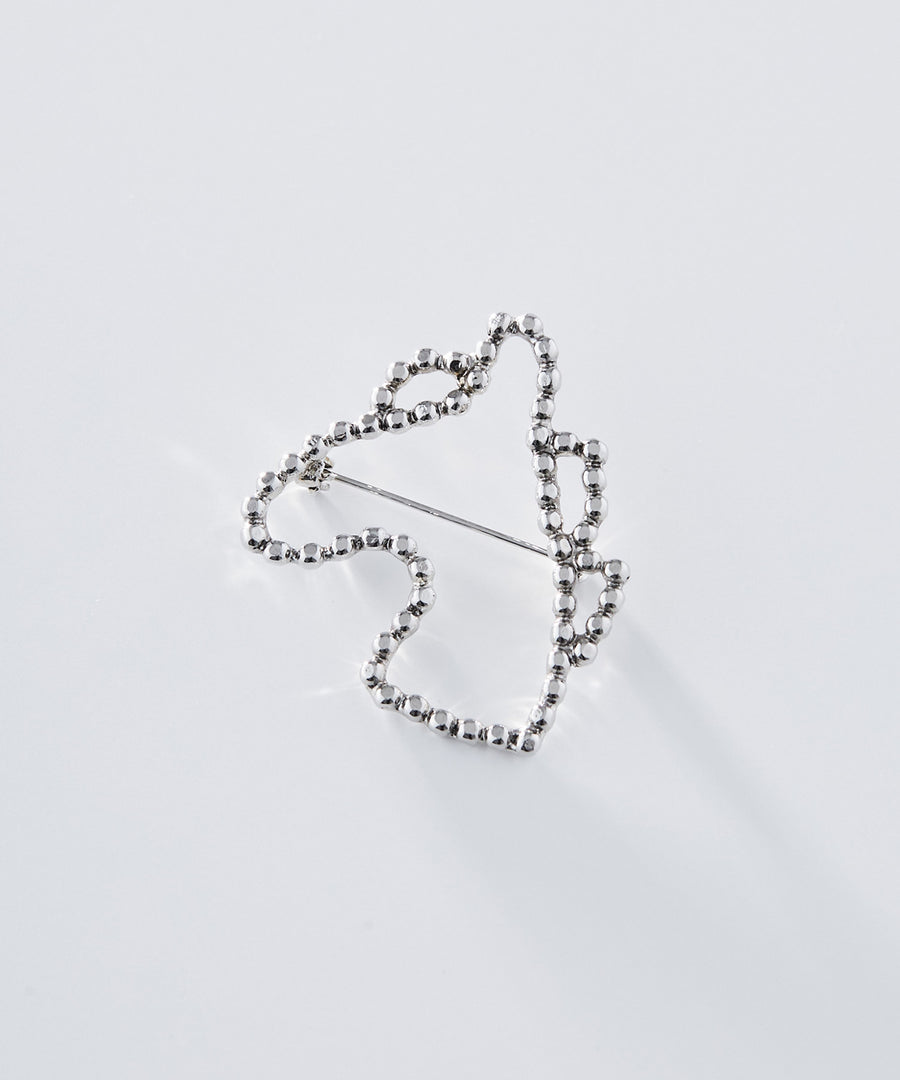 CUTSTEEL cheval brooch