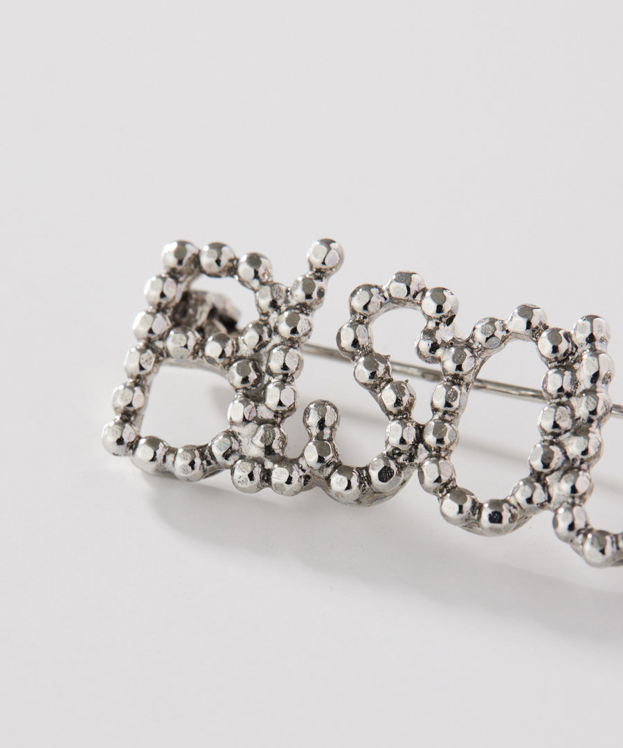 CUTSTEEL bisous brooch